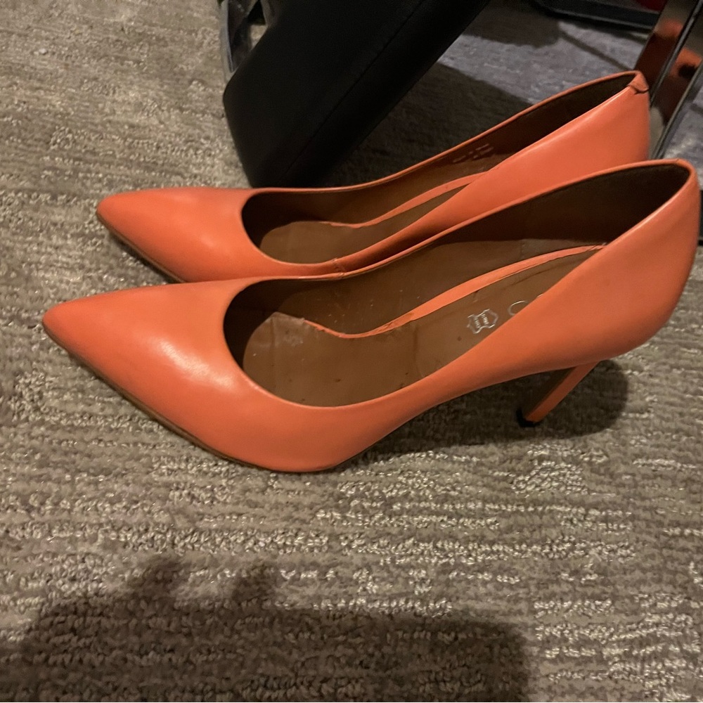 Bright orange heels